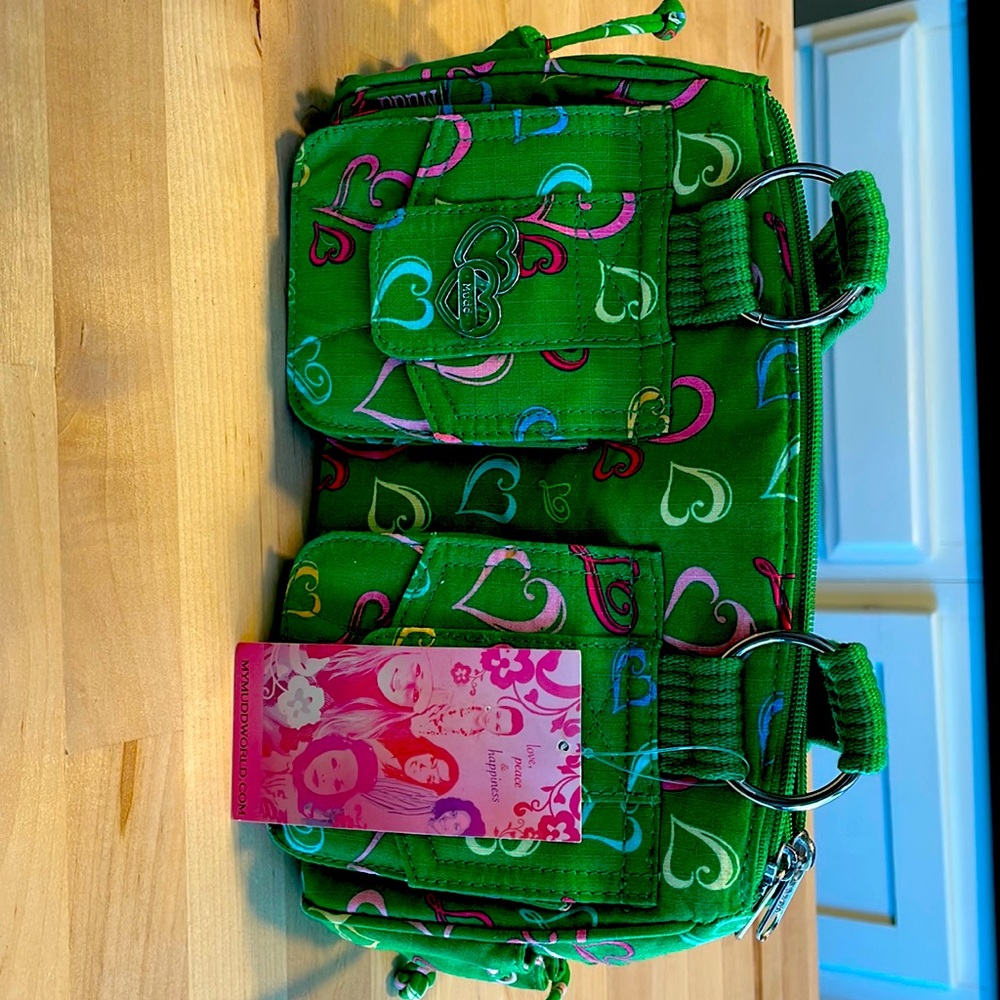 Muddy Hearts purse. New with tags. Super cute!